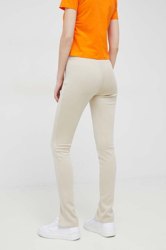 Odzież Calvin Klein spodnie K20K205357.PPYX beżowy