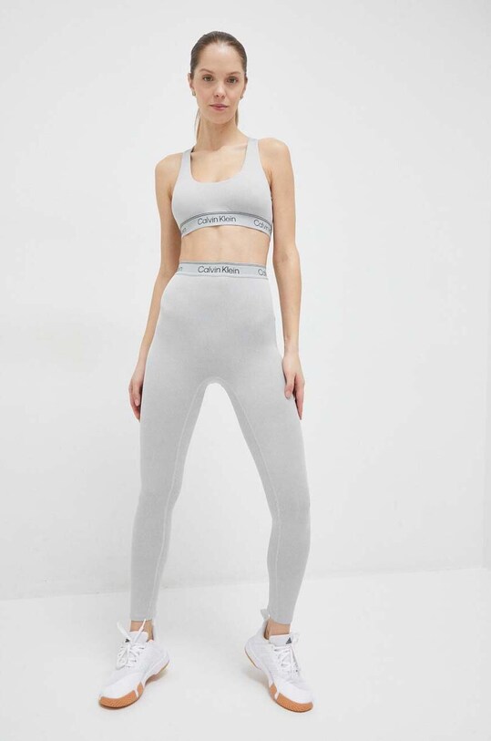 Tréninkové legíny Calvin Klein Performance CK Athletic 00GWS3L605 šedá AW23