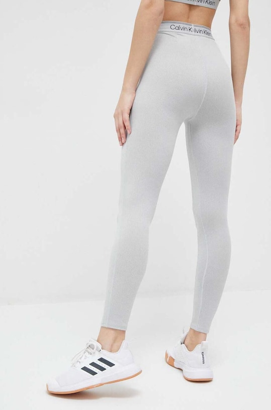Oblečení Tréninkové legíny Calvin Klein Performance CK Athletic 00GWS3L605 šedá