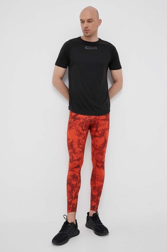 adidas Performance legginsy treningowe Paris Techfit wzorzyste pomarańczowy HS6789
