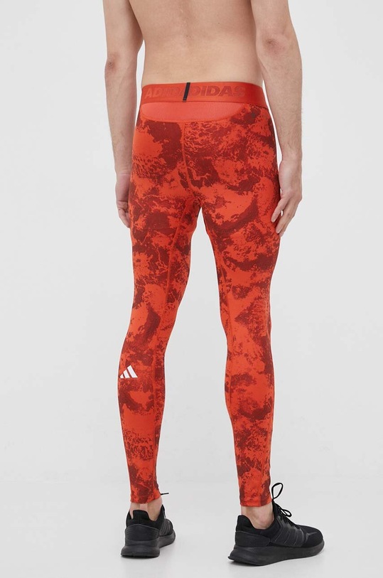 Odzież adidas Performance legginsy treningowe Paris Techfit HS6789 pomarańczowy