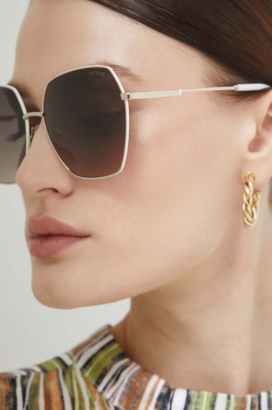 Guess okulary przeciwsłoneczne GU7785.6332F beżowy