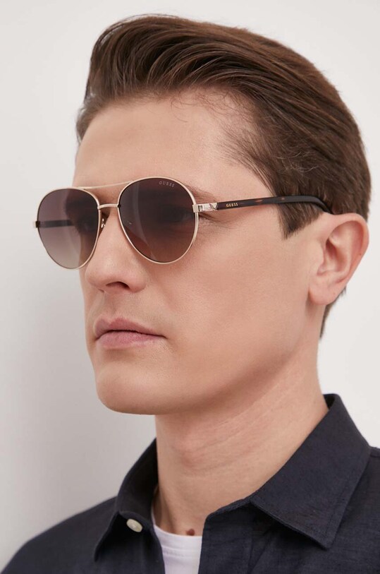 Doplňky Sluneční brýle Guess GU5213.5632F béžová