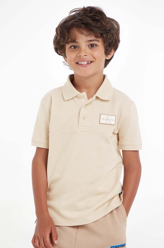 Calvin Klein Jeans polo dziecięce aplikacja beżowy IB0IB01637.PPYX