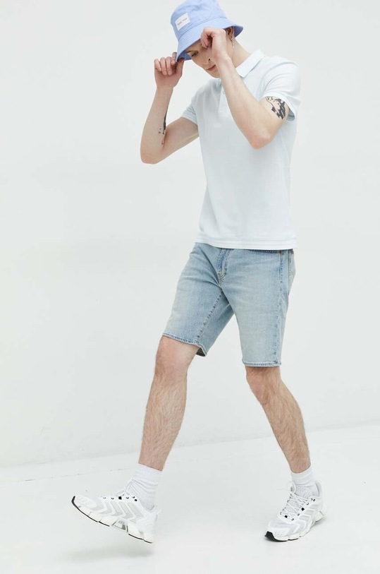 Tommy Jeans polo bawełniane DM0DM16219.PPYX niebieski SS23