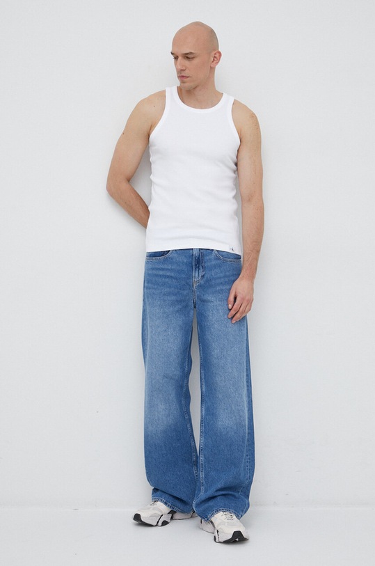 Calvin Klein Jeans jeansy 90s J30J322818.PPYX niebieski SS23