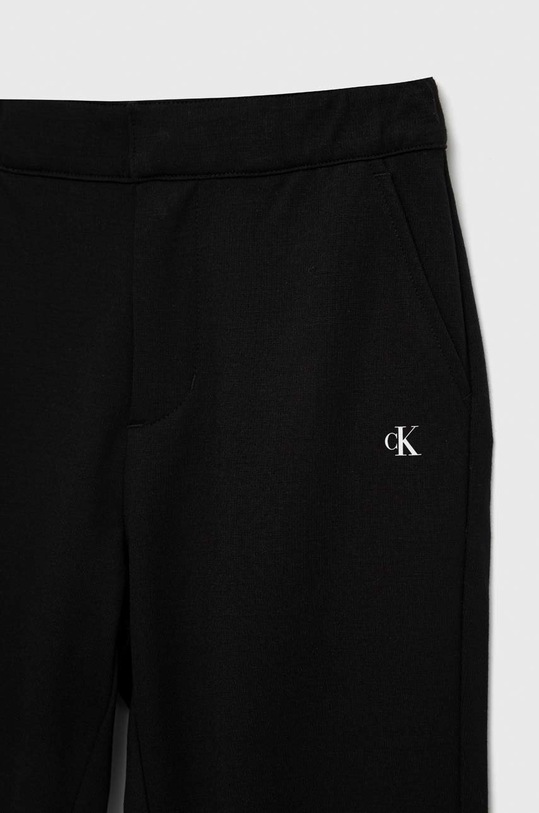 Chłopiec Calvin Klein Jeans spodnie dziecięce IB0IB01482.PPYX czarny