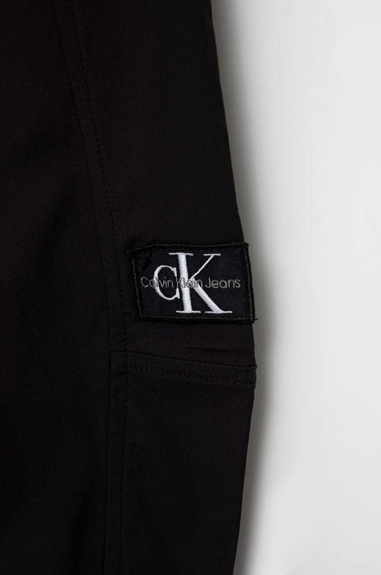 Chlapec Detské tepláky Calvin Klein Jeans IB0IB01507.PPYX čierna