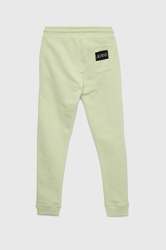 Otroška bombažna trenirka Calvin Klein Jeans IU0IU00289.PPYX zelena SS23