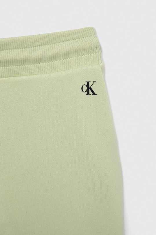 Dečki Otroška bombažna trenirka Calvin Klein Jeans IU0IU00289.PPYX zelena