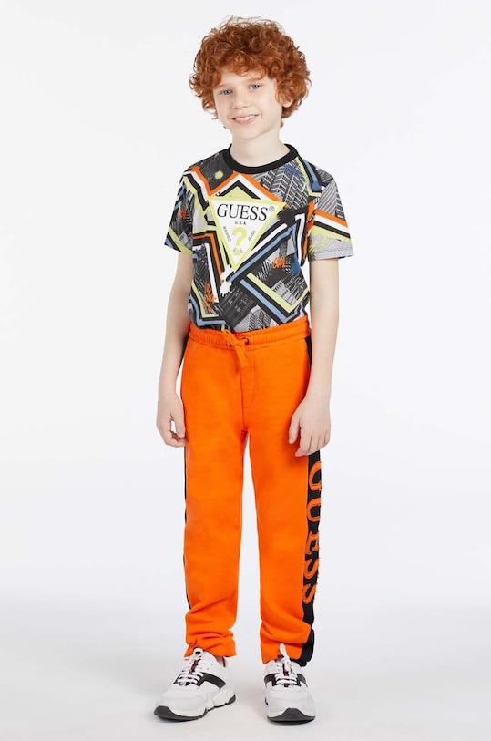 Detské bavlnené tepláky Guess bavlna oranžová L3RQ24.KA6R3.PPYX