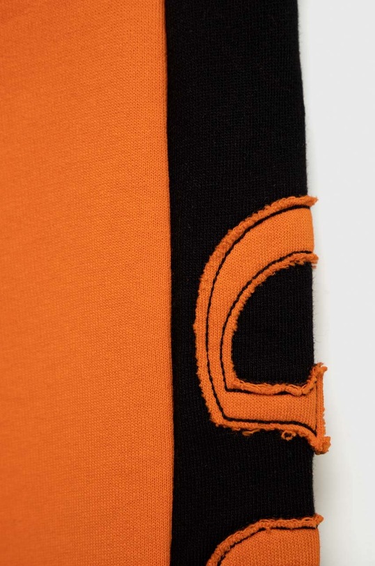 Detské bavlnené tepláky Guess oranžová L3RQ24.KA6R3.PPYX