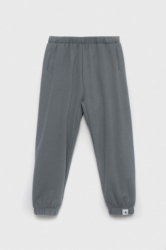 Detské tepláky Calvin Klein Jeans s elastanom sivá IB0IB01592.PPYX