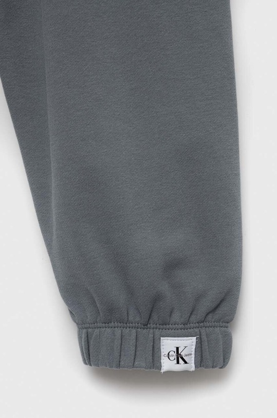 Chłopiec Calvin Klein Jeans spodnie dresowe dziecięce IB0IB01592.PPYX szary
