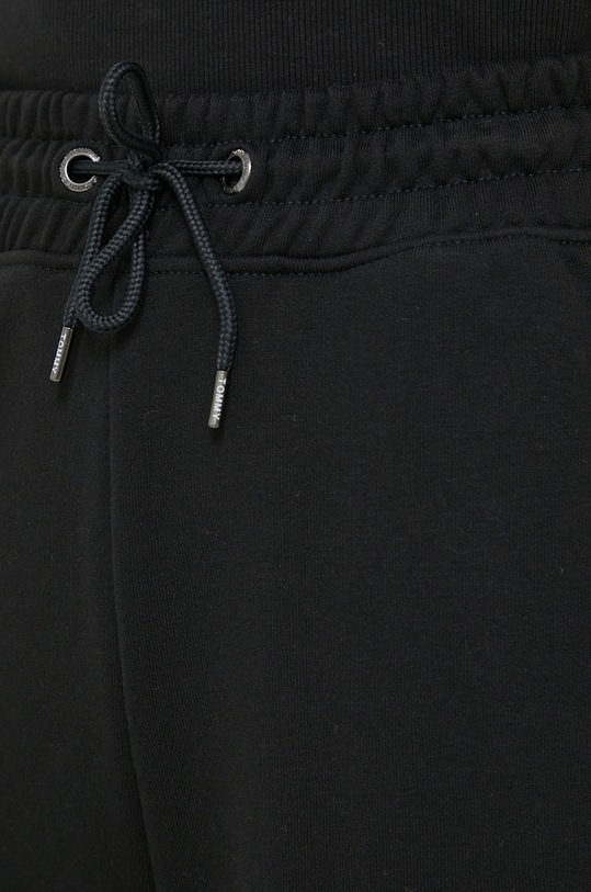Tepláky Tommy Jeans černá DW0DW14994.PPYX