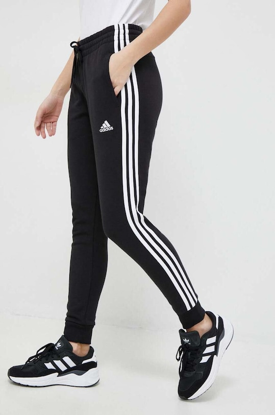 adidas spodnie dresowe Essentials aplikacja czarny IC8770