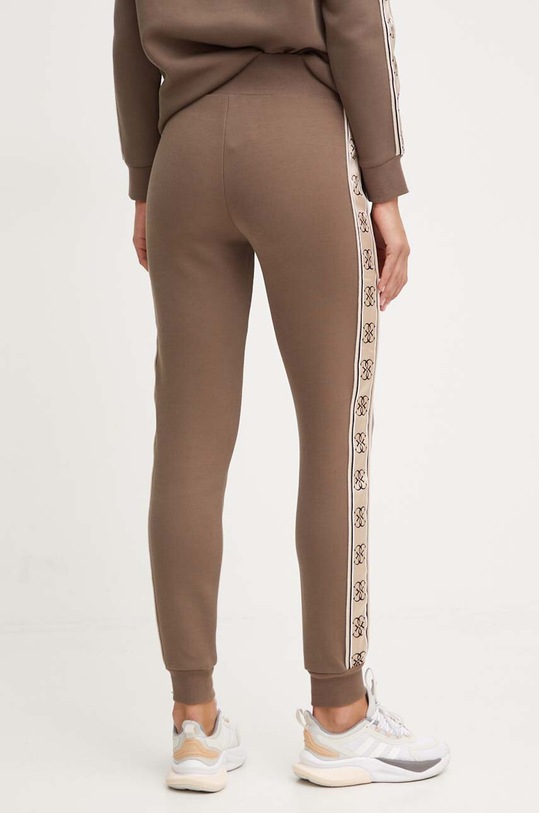 Odzież Guess spodnie dresowe BRITNEY V2YB15.KB3P2 brązowy