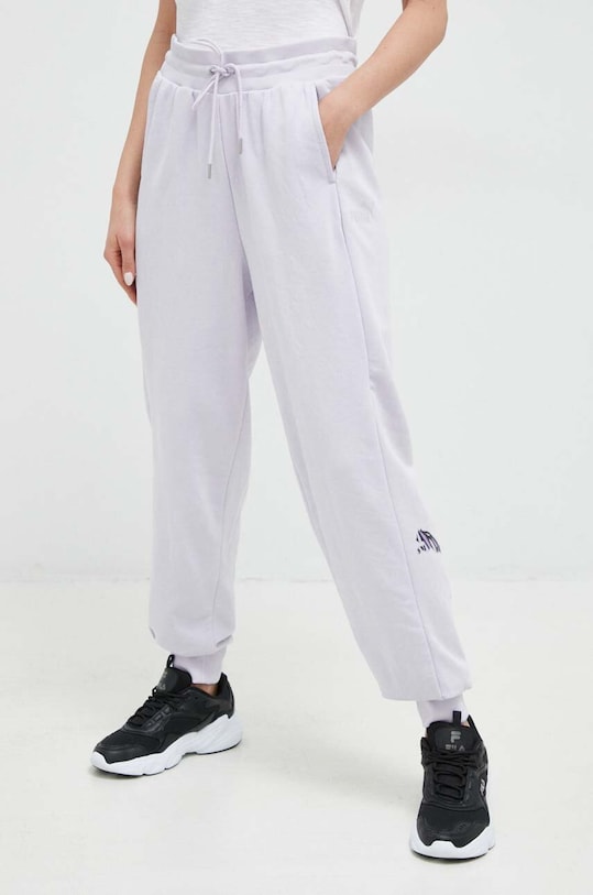 Спортивные штаны Puma трикотаж фиолетовой 674447