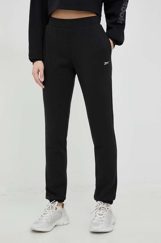 Reebok spodnie dresowe dzianina czarny HS4692