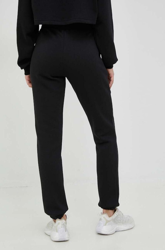 Odzież Reebok spodnie dresowe HS4692 czarny