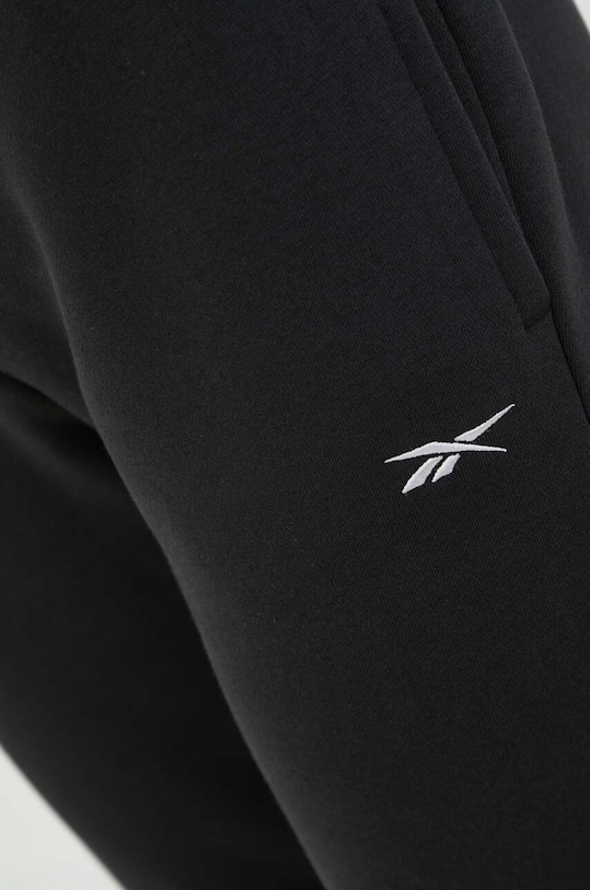 Reebok spodnie dresowe czarny HS4692