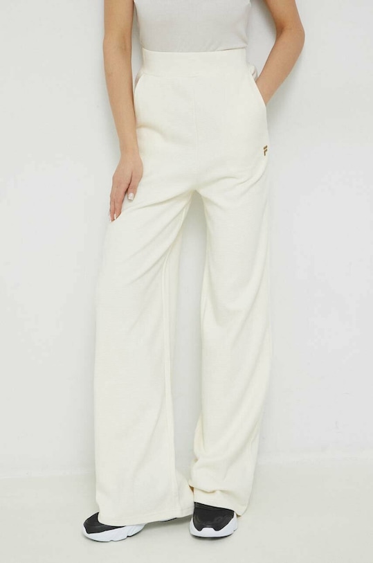 Fila spodnie dresowe bawełniane bawełna beżowy FAW0543