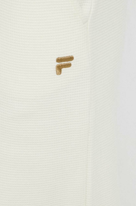 Fila spodnie dresowe bawełniane beżowy FAW0543