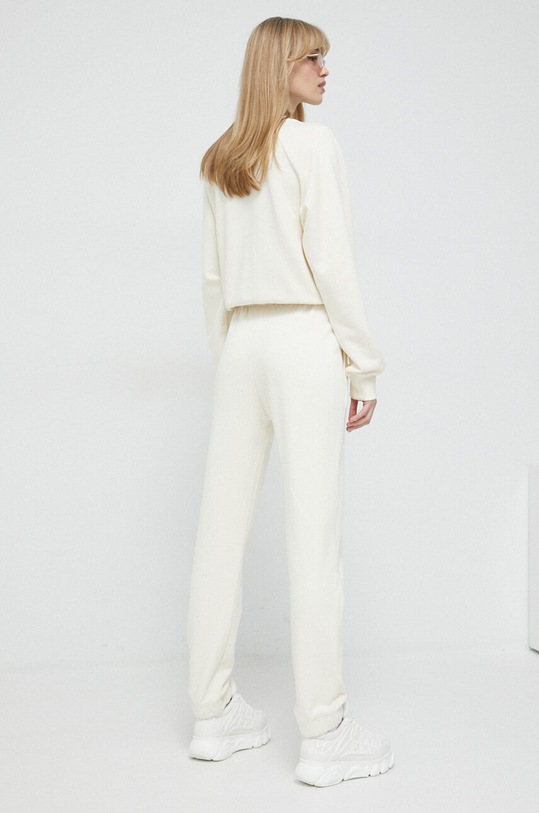 Odzież Chiara Ferragni spodnie dresowe bawełniane 74CBAT01 beżowy