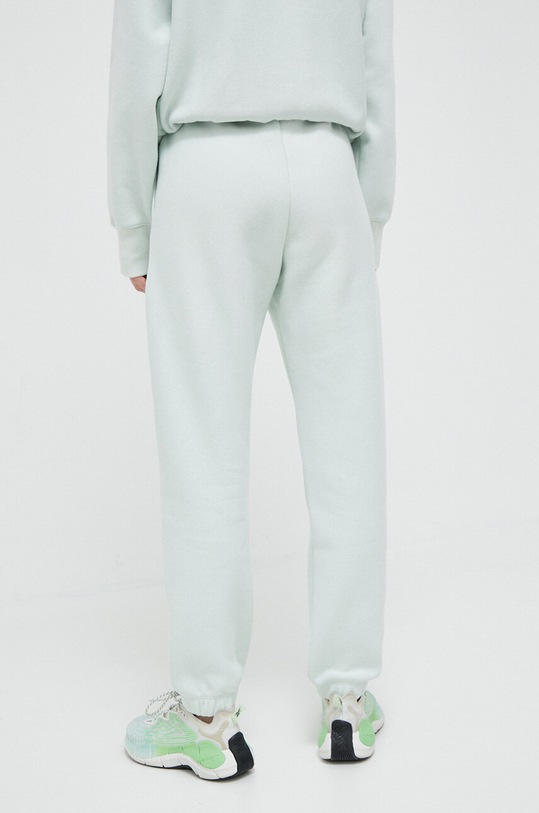 Odzież Champion spodnie dresowe 116243 zielony