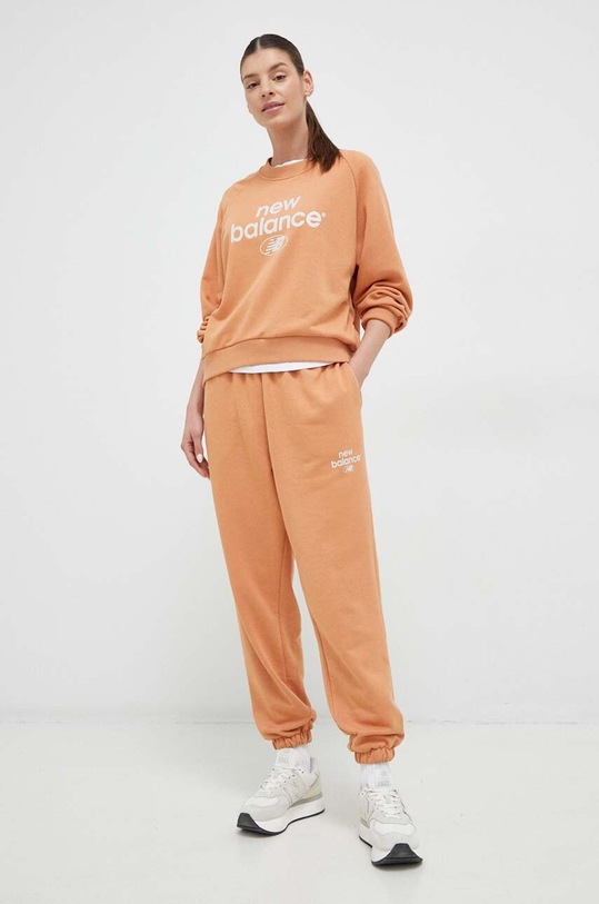 New Balance pantaloni de trening tricotaj portocaliu WP31508SEI
