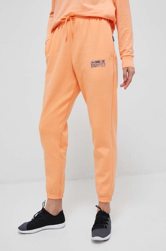 Under Armour spodnie dresowe dzianina pomarańczowy 1377175.D