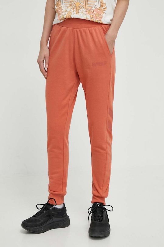 Hummel spodnie dresowe hmlLEGACY WOMAN TAPERED PANTS nadruk pomarańczowy 212564