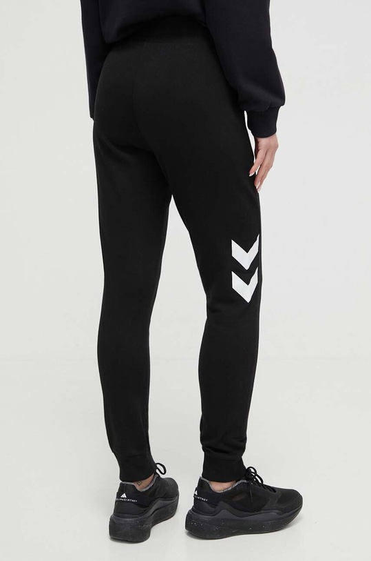 Odzież Hummel spodnie dresowe hmlLEGACY WOMAN TAPERED PANTS 212564 czarny
