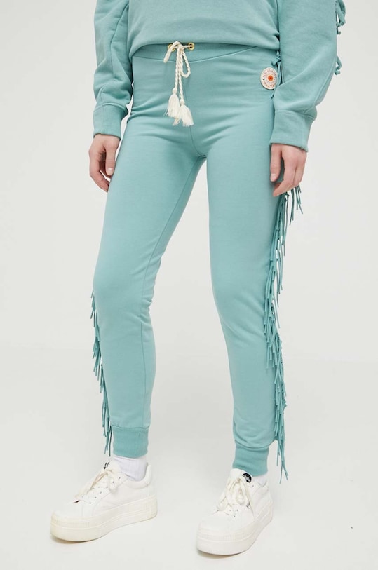 Femi Stories spodnie dresowe z elastanem turkusowy ARDEN