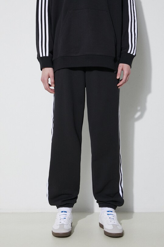 Хлопковые спортивные штаны adidas Originals чёрный IB7457
