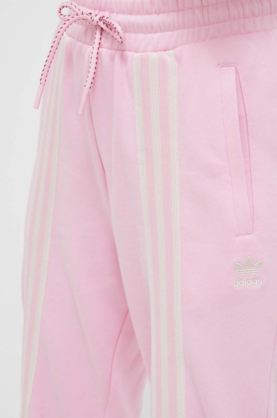 Bavlněné tepláky adidas Originals růžová IK7854