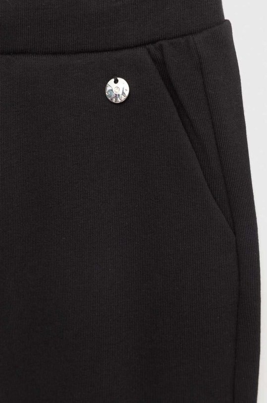 Dziewczynka Sisley spodnie dresowe dziecięce 39W3XF00Q.G.SEASONAL czarny