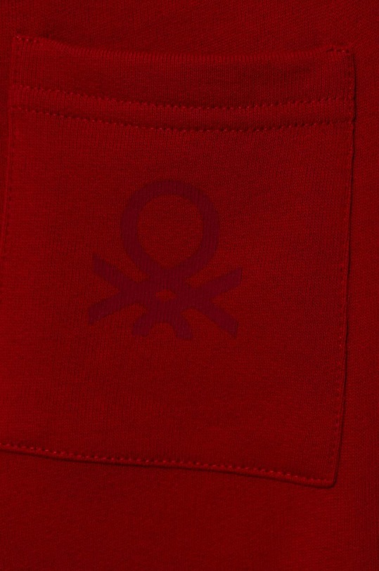 Chłopiec United Colors of Benetton spodnie dresowe bawełniane dziecięce 3J70GF010.P.SEASONAL czerwony