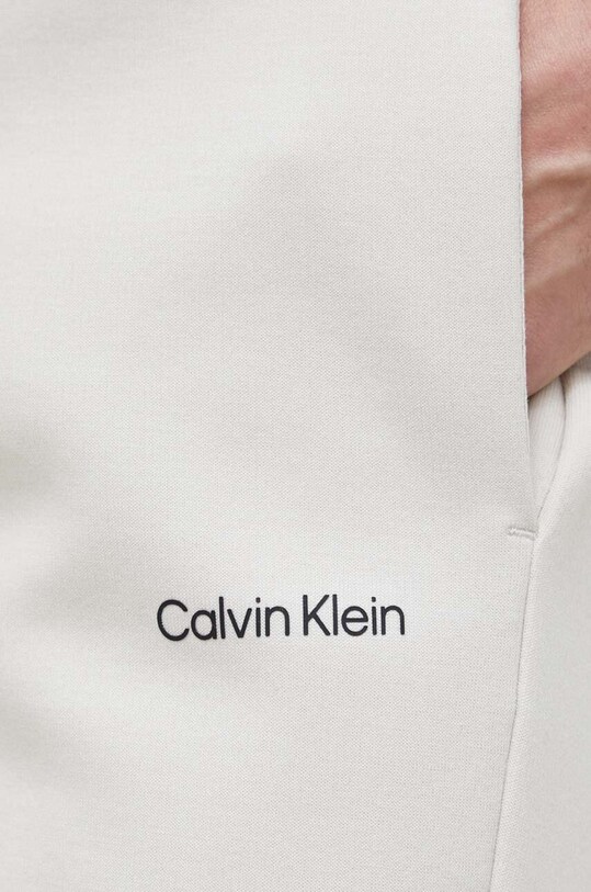 Παντελόνι φόρμας Calvin Klein μπεζ K10K109940.PPYX