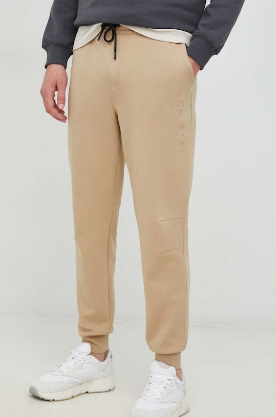Calvin Klein pantaloni de trening tricotaj bej K10K108047.PPYX