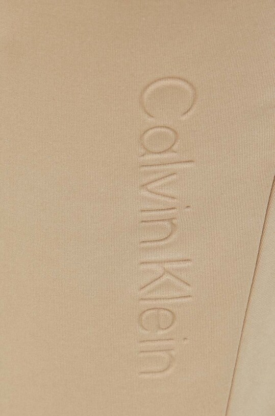 Calvin Klein spodnie dresowe beżowy K10K108047.PPYX
