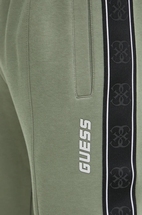 Tepláky Guess MICKEY zelená Z2YB09.KB3P2