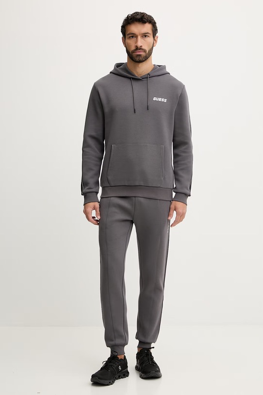 Guess spodnie dresowe MICKEY Z2YB09.KB3P2 szary SS26