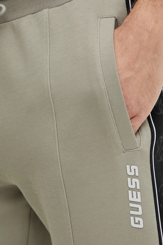 Guess spodnie dresowe MICKEY zielony Z2YB09.KB3P2