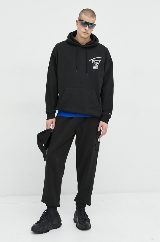 Bavlněné tepláky Tommy Jeans DM0DM15849.PPYX černá SS23