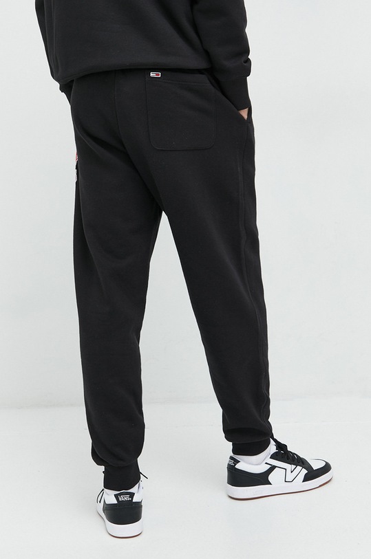 Tepláky Tommy Jeans DM0DM15807.PPYX černá SS23
