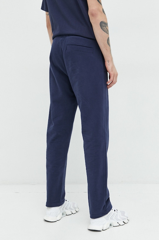 Oblečenie Bavlnené tepláky Tommy Jeans DM0DM15792.PPYX tmavomodrá