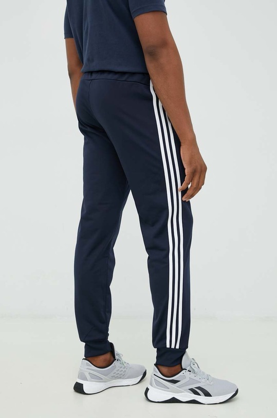 Odzież adidas spodnie dresowe Essentials H46106 granatowy