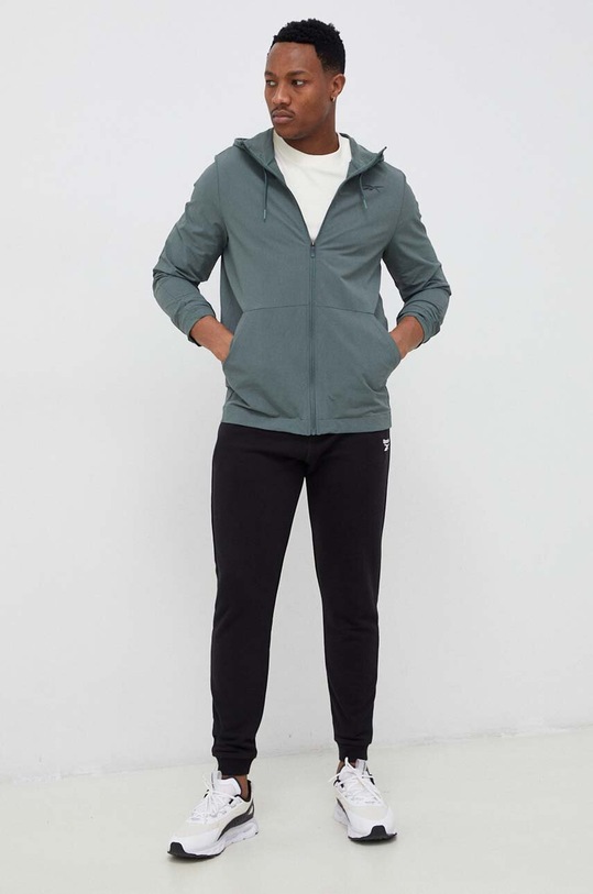 Reebok spodnie dresowe IDENTITY HS7376 czarny AW23