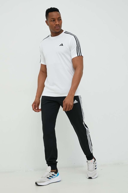adidas spodnie treningowe Essentials IC0041 czarny SS23